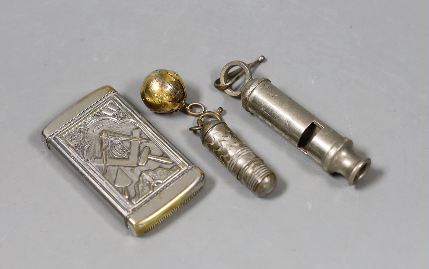 A Masonic gilt metal folding crucifix, Masonic vesta case, Police whistle, and dice case